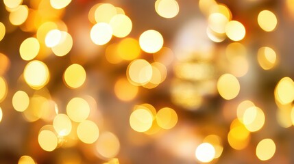 Obraz premium The warm glow of golden bokeh lights brings a soothing ambiance, ideal for festive occasions and cozy moments with loved ones