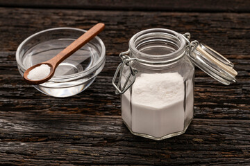 Glass jar with baking soda to mix with water - Healthy food.
