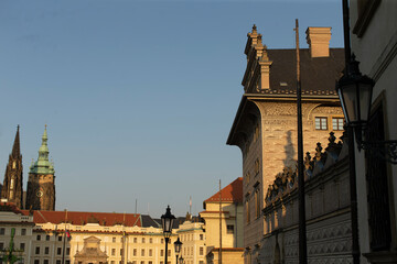 A slightly blurry picture capturing the essence of a bustling city, featuring a few distinct buildings outlined in the background