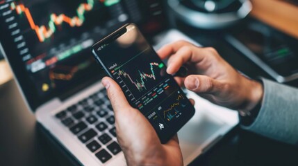 person typing on a phone for trading 
