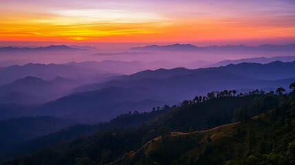 Fototapeta premium Majestic mountain range at sunrise with glowing peaks and vibrant sky, nature landscape background