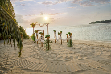 Natural Wedding set up on beach. Beautiful tropical outdoor ceremony or party with ocean view. Eco destination weddings concept
