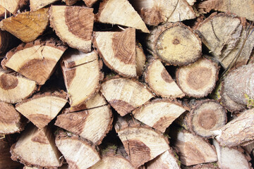 Fototapeta premium split firewood piled on a pile.