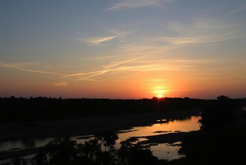 Sunset Reflection River Capture the sunset’s reflection on the