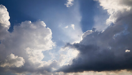 Obraz premium Sunbeams through Cloudy Sky