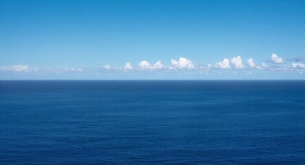 Bright blue summer ocean background vast ocean stretching into the bright blue sky