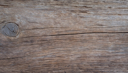 Obraz premium Weathered wooden texture with knots and grains.