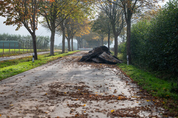 Road construction in Germany. Crushed concrete blocks of the old street on a country road.