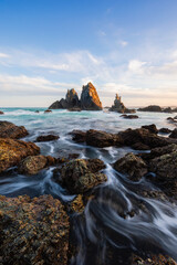 Beautiful water flowing with Camel Rock view, Bermagui, Australia.