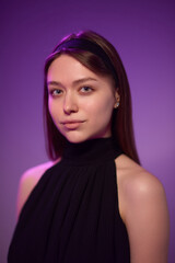 Fototapeta premium An Elegant and Striking Portrait of a Young Woman Radiating Natural Beauty and Graceful Charm