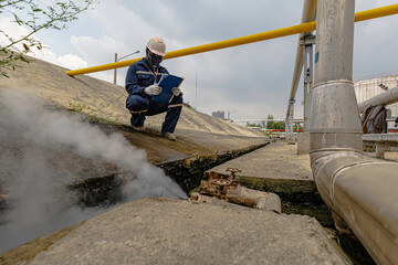 Male worker inspection visual pipeline oil and gas corrosion rust through socket tube steam gas...