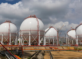 White spherical propane tanks containing