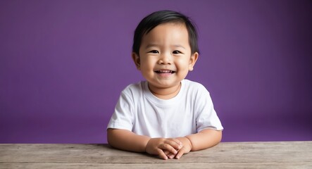 Naklejka premium southeast asian toddler boy purple background wearing plain white tshirt smiling happy portrait