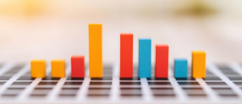 Colorful bar graph analysis on a grid background for statistical representation.