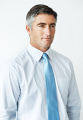 Mature man, thinking and business in studio with fashion, ambition and professional with experience. Politician, confident or idea on white background for campaign drive, future election or assertive