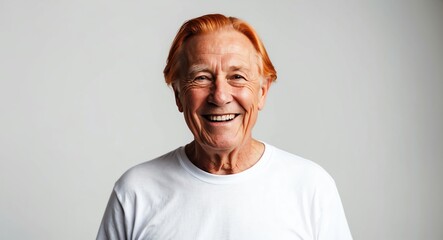 Obraz premium redhead elderly man white background wearing plain white tshirt smiling happy portrait