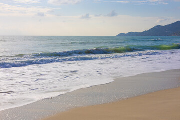 Tropical sea beach wave white sand sunny day