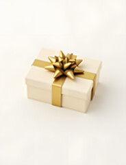 Obraz premium Isolated gift card in golden bow surrounded by white space on a plain background.