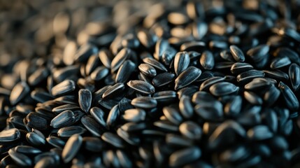 Obraz premium Close-up of black sunflower seeds background 