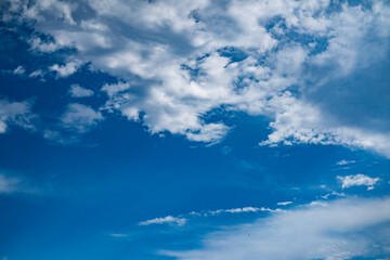 Blue sky with clouds. Natural and cloudy blue sky background. Natural sky background. Blue sky and cloud on daytime. White clouds background.