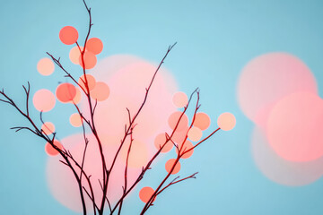 Delicate branches with vibrant bokeh lights in various colors create enchanting abstract scene against soft blue background, evoking sense of tranquility and wonder