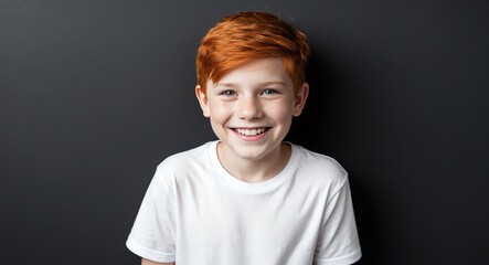 redhead teen boy black background wearing plain white tshirt smiling happy portrait