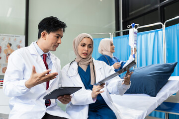 Medical team working on digital tablet healthcare doctor technology tablet using computer analyzed the results of medical reports at the hospital.