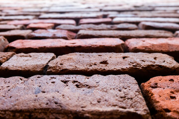 close up of old red brick wall. shot with low angle view