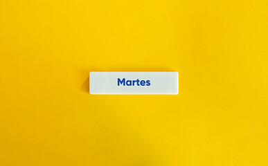 Tuesday Word and Banner. Spanish Text on Block Letter Tiles on Flat Background. Minimalist Aesthetics.