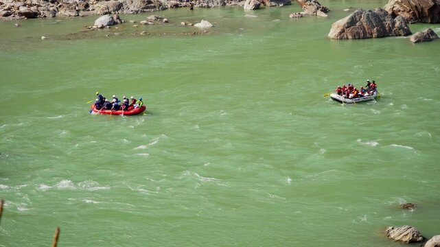 People Doing River Rafting in Ganga River, India