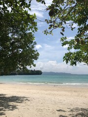 White sand blue beach.