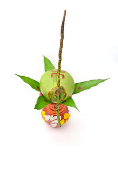 DECORATIVE COLOURFUL PUJA MANGAL GHAT TOP VIEW ON ISOLATED WHITE BACKGROUND.