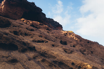 Rocky Cliff Face with Holes and Crevices