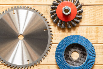 Circular Saw Blades and Wire Brush on Wood