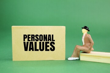 miniature people and paper with the words personal values. meaningful to individuals and influence how they live, work, and interact with others