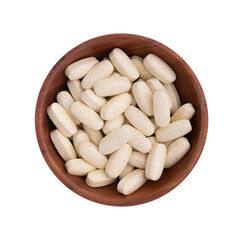 vitamin pills in bowl isolated on white, top view, health supplement