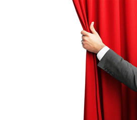 A man's hand opening red curtain isolated on transparent PNG or white background. Theatre decoration.