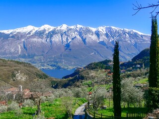 View of Priezzo, a municipality in the Comune Tremosine. In the background is the mountain range of...