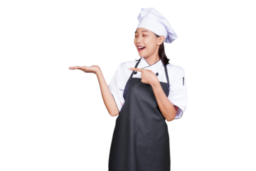 Asian woman chef in uniform pointing isolated transparent