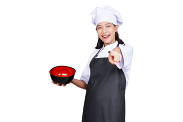 Asian woman chef in uniform pointing isolated transparent
