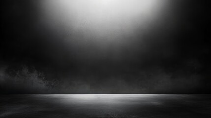 Fototapeta premium A monochromatic landscape featuring a gradient of black and white, with a subtle interplay of light and shadow creating an atmospheric effect.