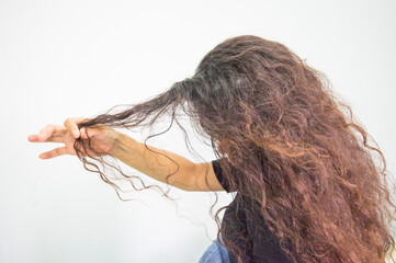 woman with long hair and damaged hair problems