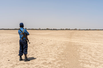 Ethiopian soldier standing guard in the Danakil Depression, Ethiopia, Africa