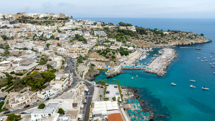 Aerial view of Castro and the city marina in the province of Lecce, Salento, Puglia, Italy. The historic center of the town is located on a promontory while the port overlooks the Adriatic sea.