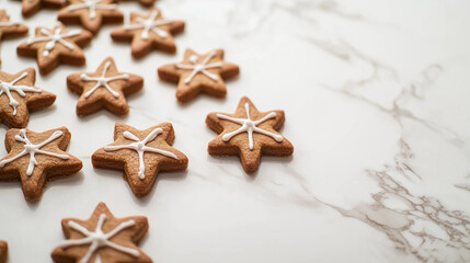 Fototapeta premium Close-up Photo of Gingerbread Cookies Shaped Like Stars with Intricate Icing Designs on a Marble Surface