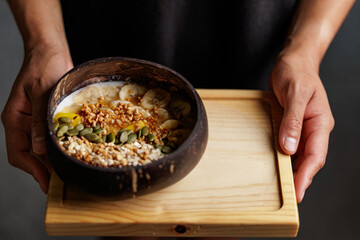 Healthy banana, apple and seeds smoothie. Healthy concept, getting energy after doing sports, ideal snack for children.