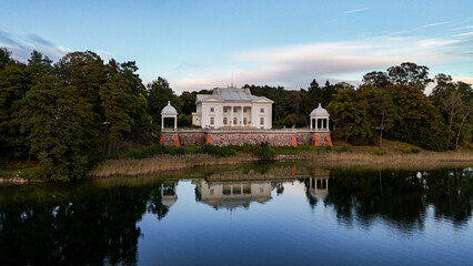 Obraz premium Aerial view of Uzutrakis Manor in Trakai, Lithuania. Užutrakis Manor is a late 19th-century. Landmarks of Lithuania 