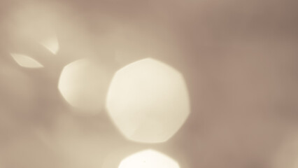 Bright golden bokeh lights create a festive and sparkling holiday ambiance