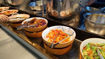 China, Canton - different style of Asian food. Self-service restaurant offering hot meals in Guangzhou.