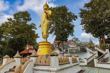 The iconic standing Buddha in Wat Phra That Khao Noi, one of the most tourist attraction...